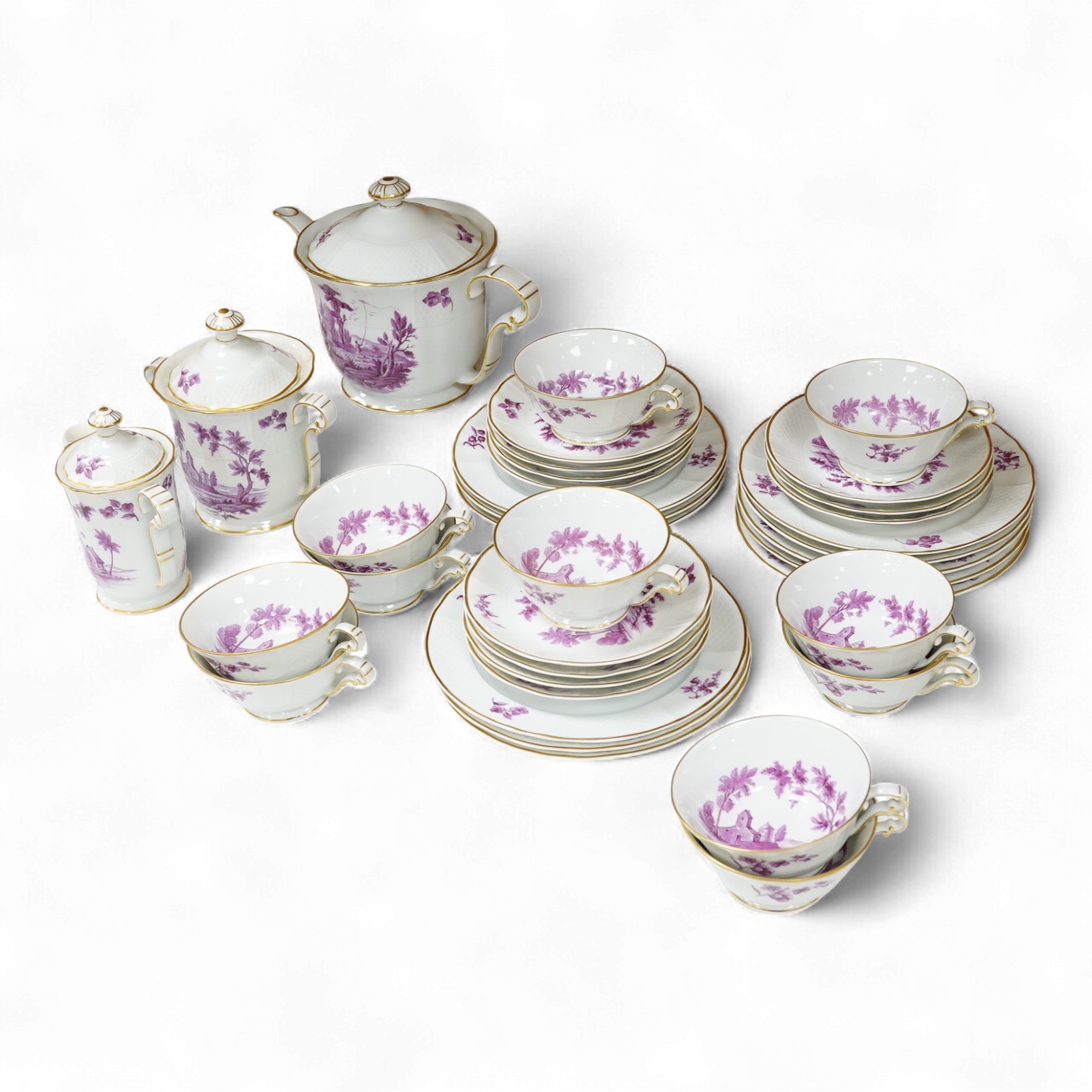 A Limoges Vincennes porcelain tea set to include milk jug, cups and saucers and teapot